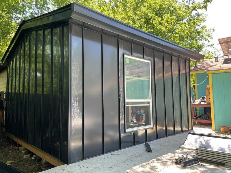 Black standing seam metal wall panels for Roof Inspection in La Feria